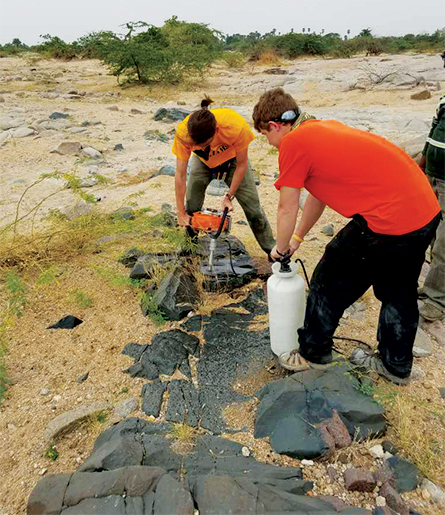 researchers at a dike
