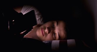 kid looking at screen late