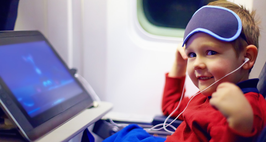 young boy on an airplane