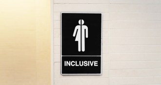 inclusive bathroom sign