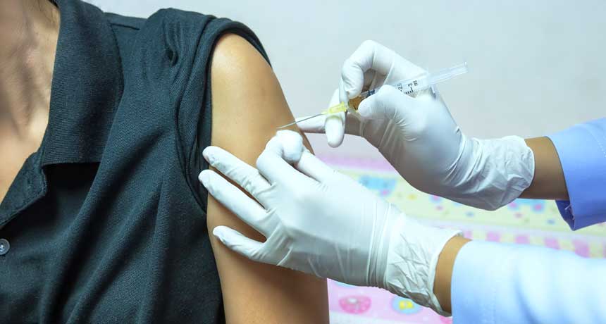 person getting a flu shot