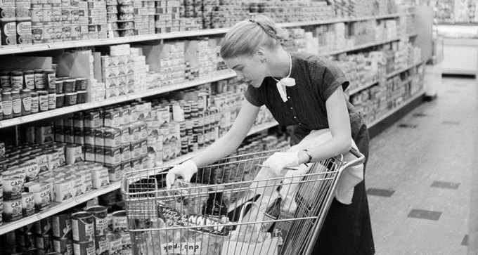 old photo of woman at grocery store