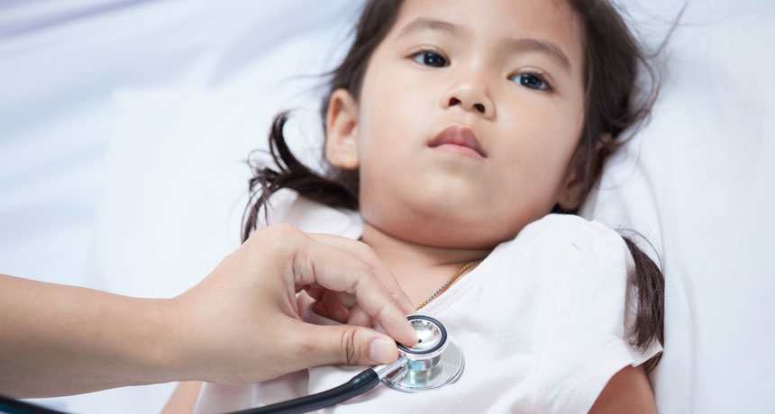 child in hospital bed