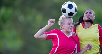 girls playing soccer