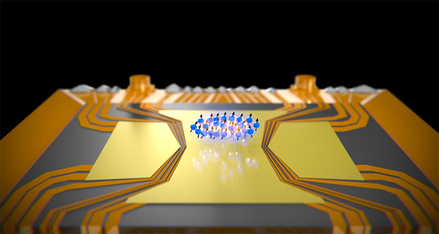 Illustration of electromagnetic fields trapping a cloud of rubidium atoms above a microchip