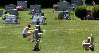woman visiting grave