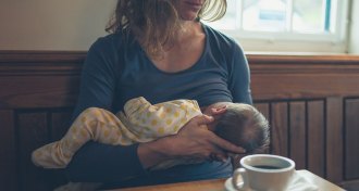 mom breastfeeding baby
