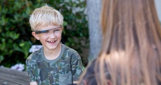 child wearing a Google Glass headset