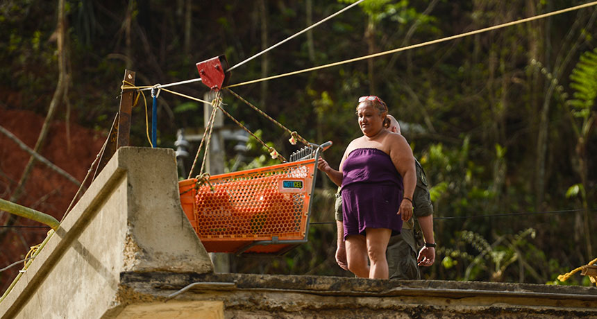 woman trying to get food across river
