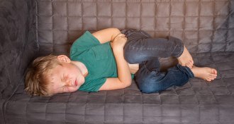 young boy with a tummy ache