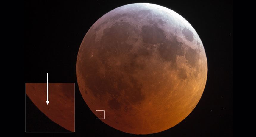 object striking moon during lunar eclipse