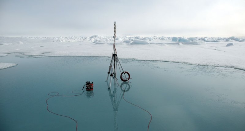a photo of a camera set up on a melt pond
