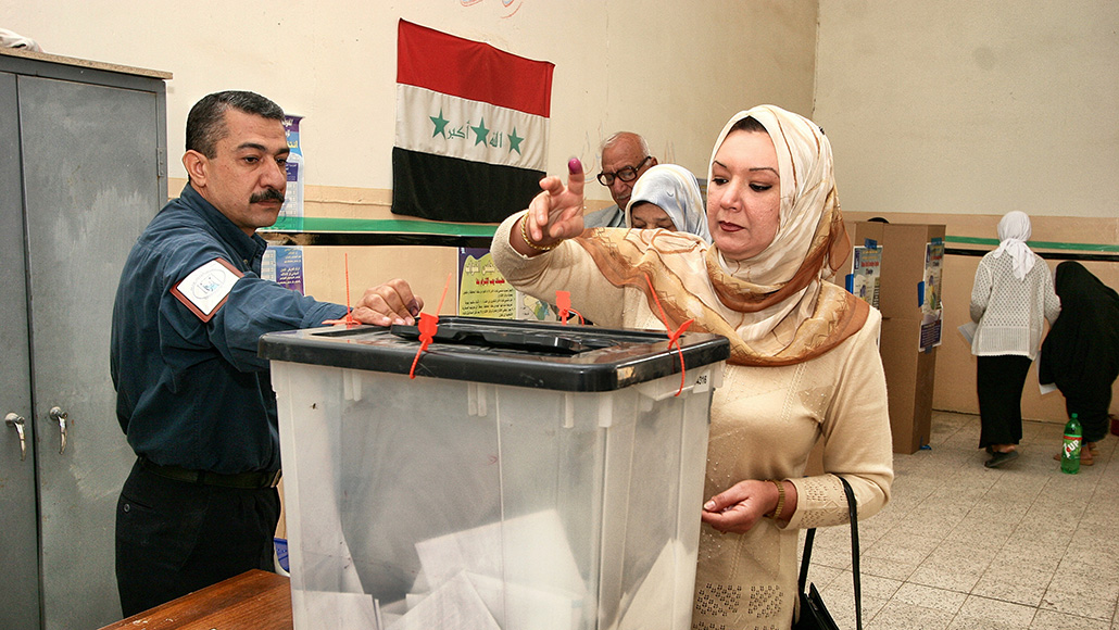 woman voting in Iraq