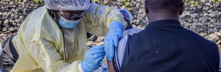 Nurse vaccinating someone in Goma