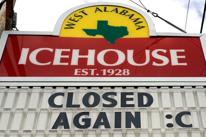 Bar sign that says "Closed Again :("