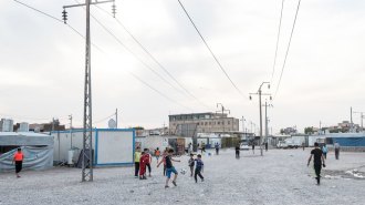 children playing soccer in Iraq
