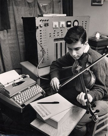 A young Ray Kurzweil plays a composition on the violin