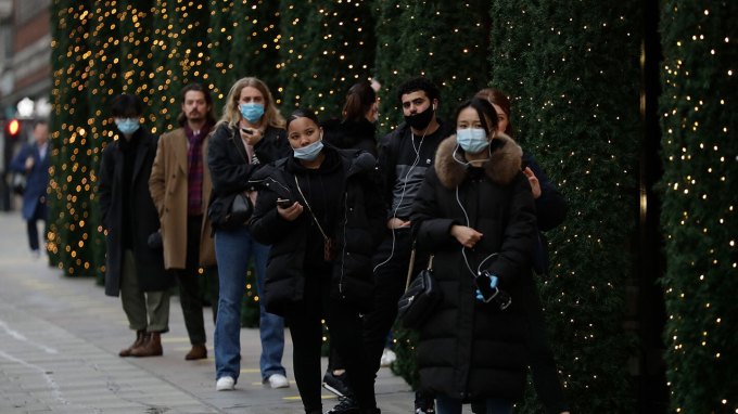 line of shoppers outside Selfridges department store