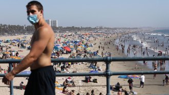 man wearing mask at Santa Monica beach