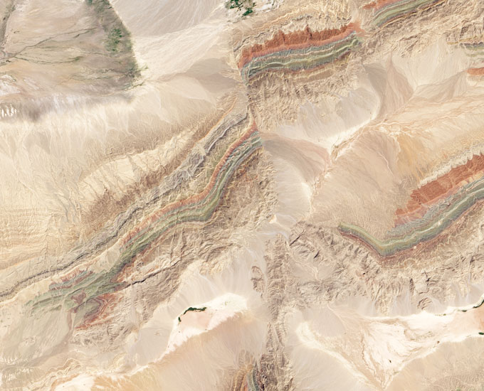 aerial photo of gray, variegated land