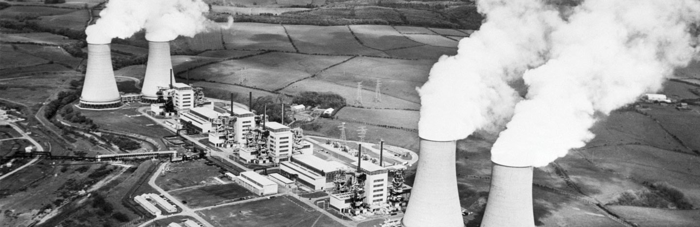 black and white image of Calder Hall power plant smokestacks