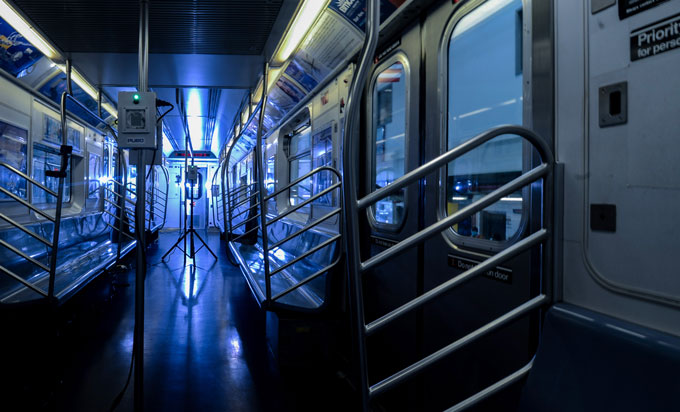 New York subway train car with blue UV lights
