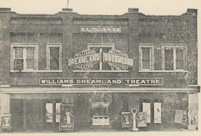 grainy black and white image of the exterior of the Dreamaland theater before the massacre