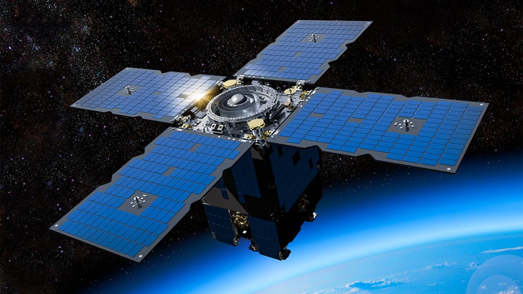 illustration of a spacecraft carrying NASA’s Deep Space Atomic Clock orbiting above Earth