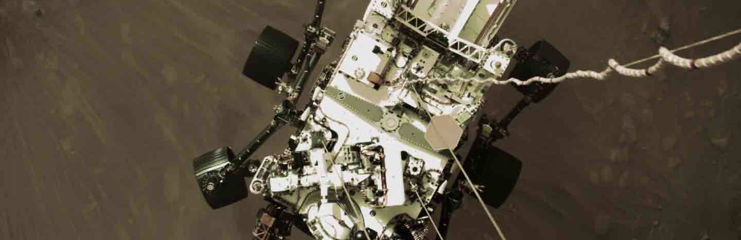 image of Perseverance rover from above, landing on Mars
