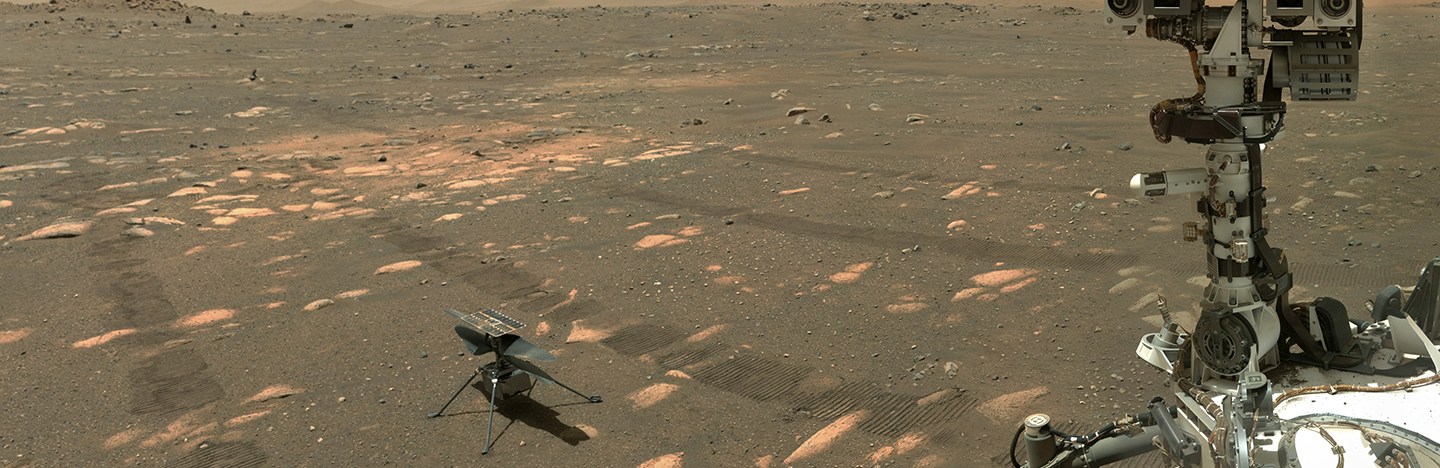 photo of NASA's Perseverance rover next to the Ingenuity helicopter on the surface of Mars