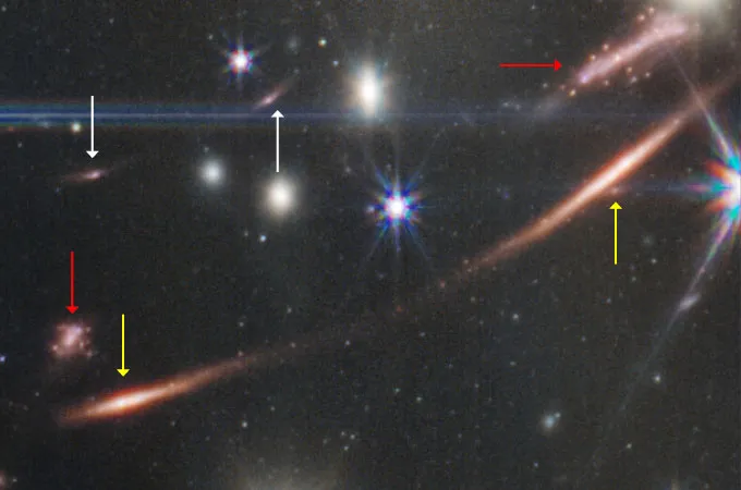 a section of the JWST deep field image with multiply imaged galaxies marked by arrows