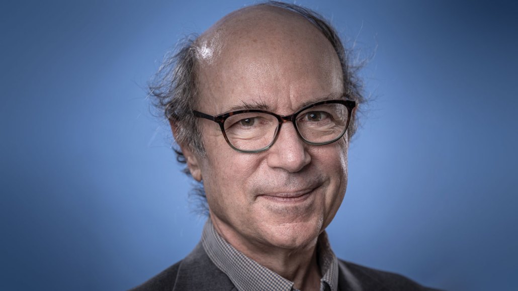 A headshot shows Frank Wilczek on a blue background.