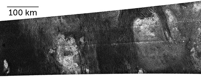 Black and white radar image of dunes on Saturn’s moon Titan