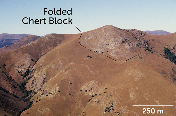 folded rock called chert sticking from the top of Barberton Greenstone Belt in South Africa