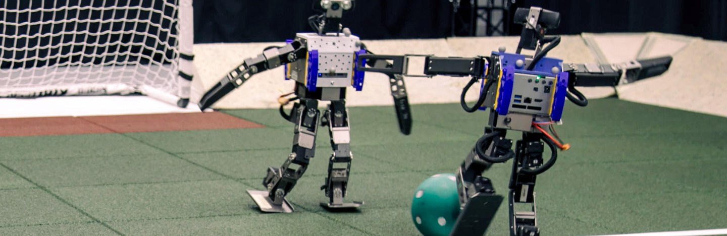 robots playing soccer