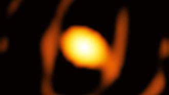 A bright yellow egg-shaped orb is shown against the black universe.