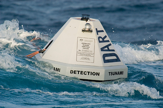 A photograph of a DART buoy in the ocean.