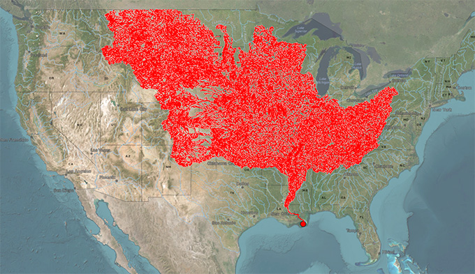 A map of the United States shows in red all the waterways that ultimately feed into the Mississippi River. The area covers a cast swath of the northern United States, coming to a point on the Gulf Coast.