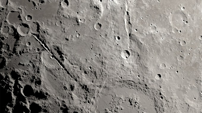 Close-up of the surface of the moon from above.