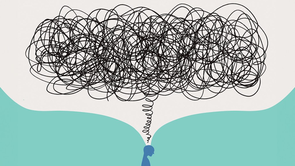 This illustration shows a silhouette of a person with a scribbled cloud rising from their head. Getting stuck in negative thoughts common to many mental health disorders.