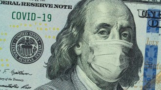 Illustrated closeup of a $100 bill with Benjamin Franklin wearing a mask over his nose and mouth. COVID-19 is written in the corner.