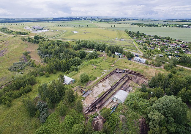 An aerial image of Schöningen, with trees and buildings in the view.