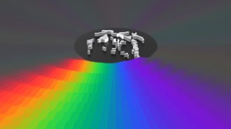 An illustration shows a rainbow of colors, meant to represent different sound pitches, emanating from a circular acoustic device.