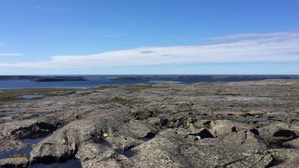 A photograph of the Nuvvuagittuq Greenstone Belt in Canada, which may contain the world's oldest rocks.