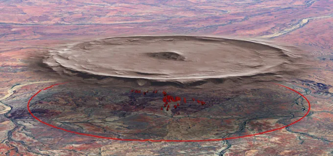 Illustration of a massive meteor impact site overlaid on a satellite image of Earth's terrain. A large, circular red outline marks the estimated boundary of the impact crater. A gray 3D model of a mountainous meteorite structure looms above the landscape.