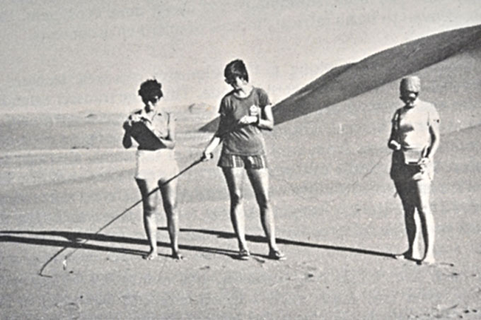 3 researchers in a black and whote photo