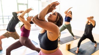 An image of women doing yoga