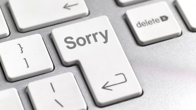 An image of a computer keyboard with a return button that says sorry