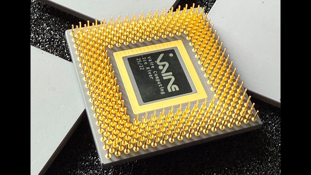 A close up of a computer chip that says VAIRE in stylized letters on the front