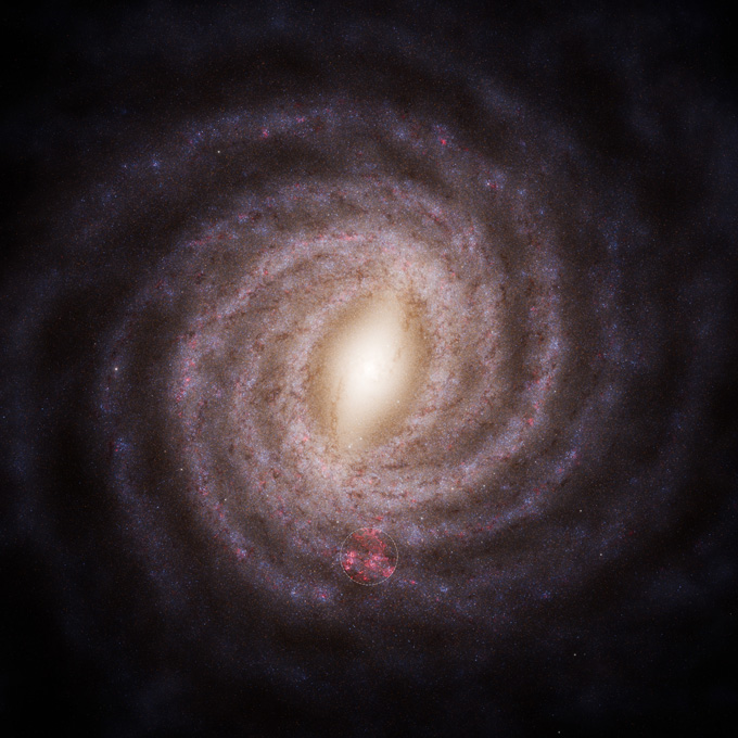 A face-on view of the spiral Milky Way galaxy. A circled region toward the bottom shows where the stellar nurseries have been mapped in 3-D.